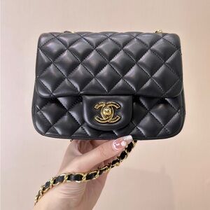 CHANEL Black Quilted Crossbody Bag with Gold Accents